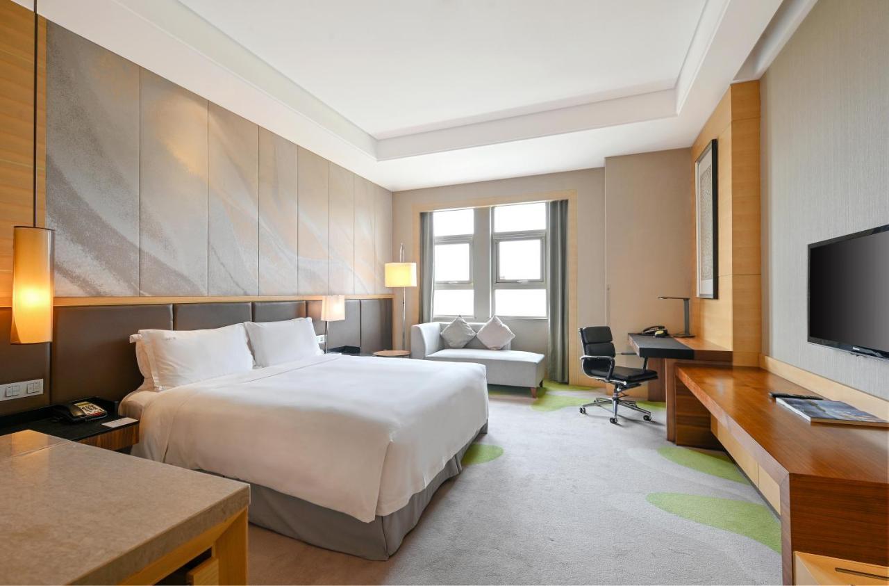 Hai Tian Expo Hotel Qingdao Exterior foto